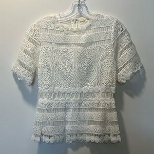 White lace overlay short sleeve peplum style shirt top